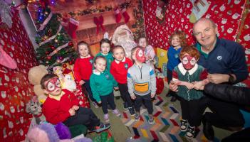 IN PICTURES: Santa welcomes families to Hollybush Primary School open day
