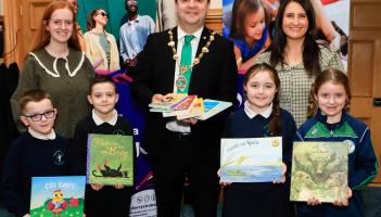 IN PICTURES: Irish language books to local Gaelscoileanna for World Book Day