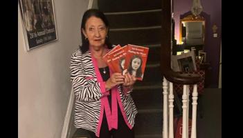 Ray McGinley with her newly published memoir, 'Finding the Music'.