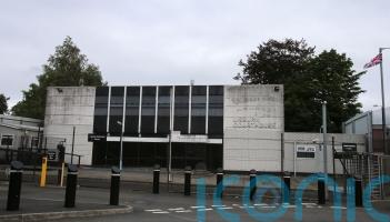 Two men charged with intimidation and making hoax bomb threats