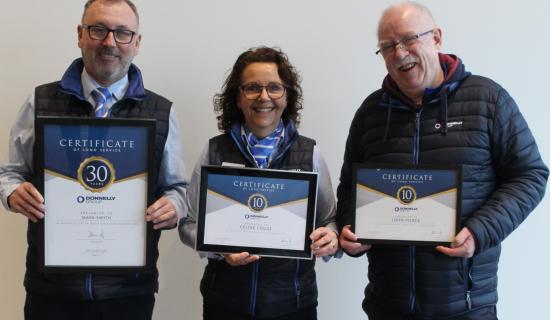 Over a century of service honoured at Donnelly Group Campsie