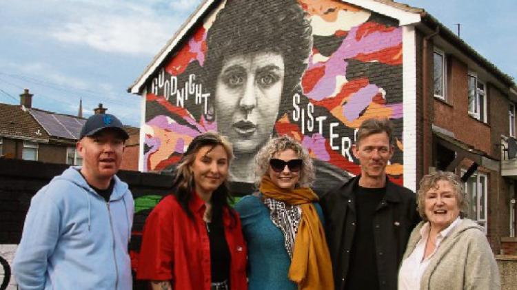 Carmel McCafferty & her daughter Muire pictured with Peaball Artists, Ray Bonner, Jane Kalmberza & Donal O' Doherty at the unveiling of the Nell McCafferty Mural in Lisfannon Park.  PHOTO: D Heaney.