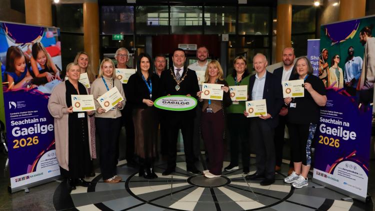 Mayor Ruair&iacute; McHugh with staff of Derry City and Strabane District Council who took part in the F&aacute;inne scheme as part of the Irish Language Week 2026 celebrations.  