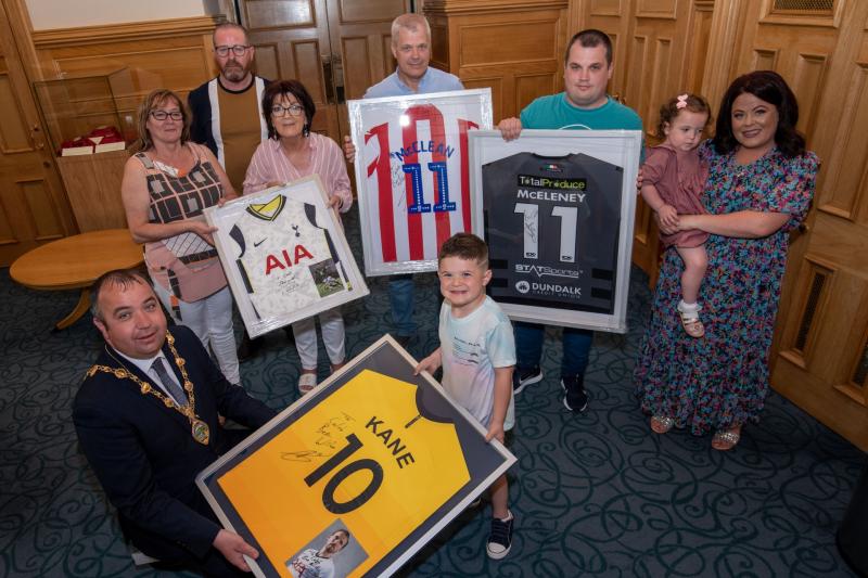 Young Derry boy who recently underwent brain surgery shows off jerseys he received from his football heroes
