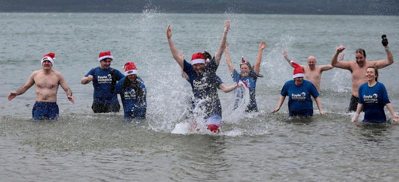 Derry fundraisers make a splash at Christmas Day Swim