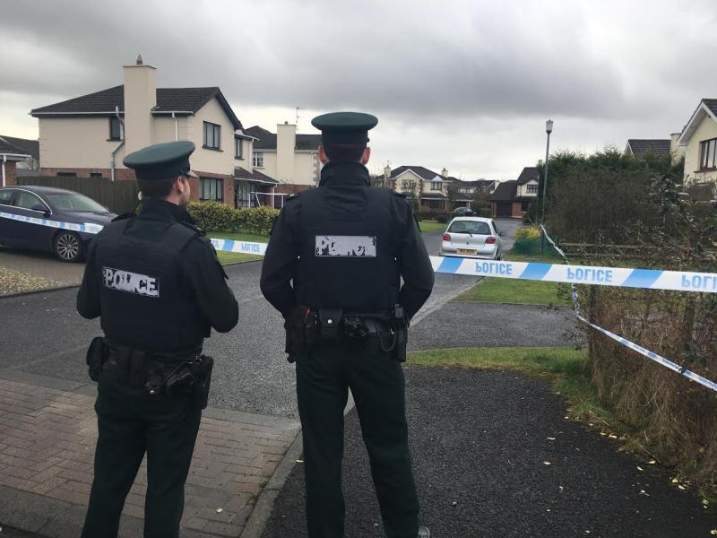 Security alert continuing as device found outside home of a serving