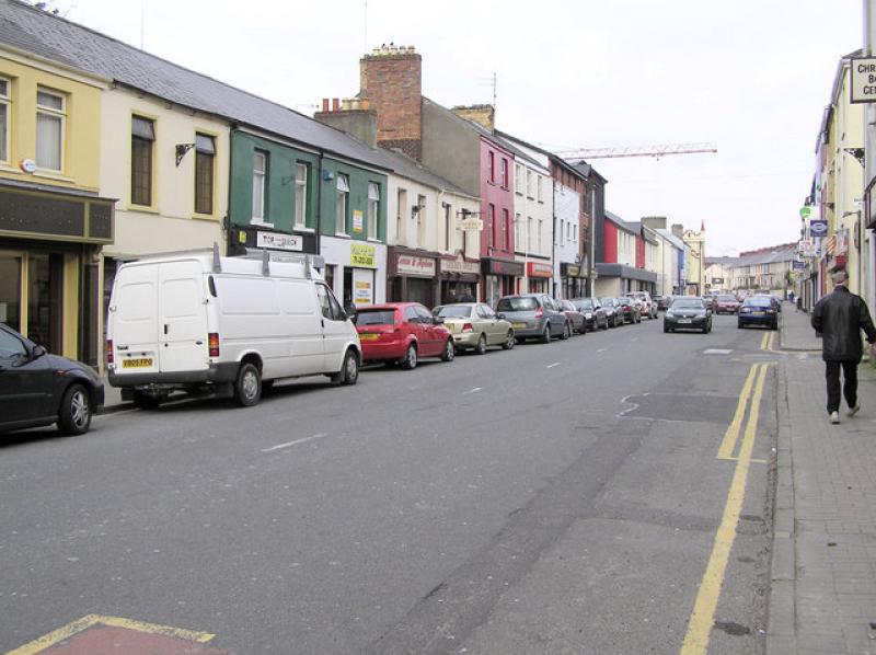 Derry street sealed off after man falls from roof