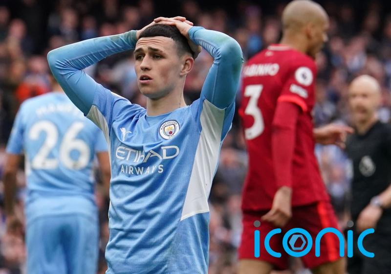 Manchester City retain slender Premier League lead after thrilling draw with Liverpool