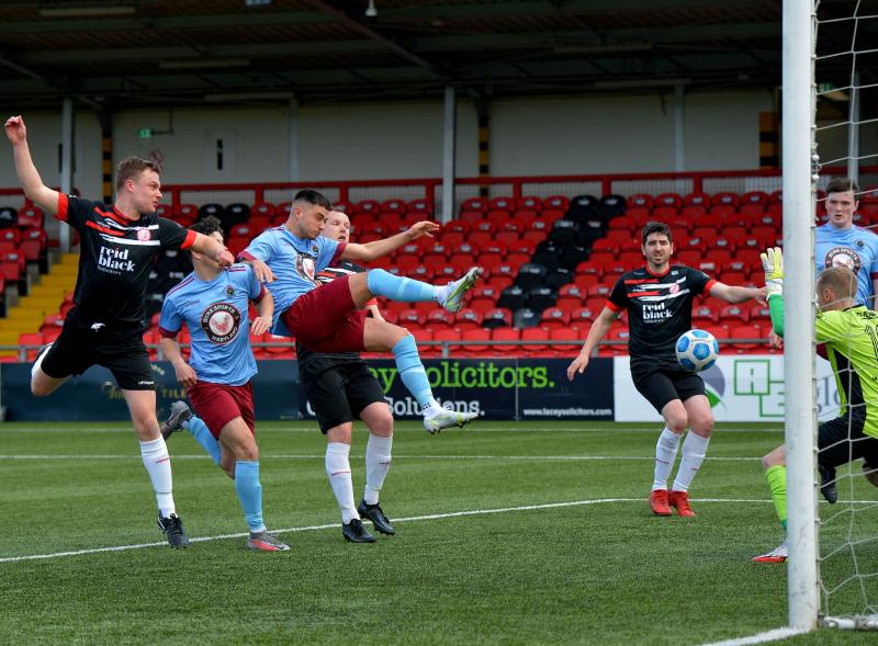 Institute secure third successive league win with late McLaughlin strike