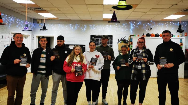 CRJ staff Mickey Anderson(left) and Eamon Mc Ginley(Right) pictured with Youth leaders from the Glen and Rosemount at the fireworks safety work