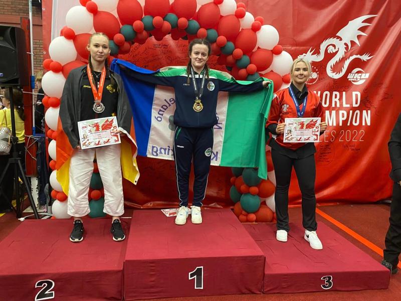 First Minister's encouragement for world champion Caitlin