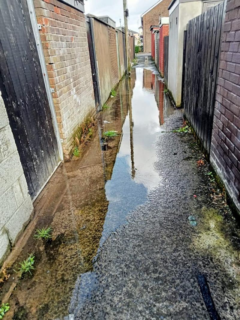 Concern after human waste found in flooded Derry laneway