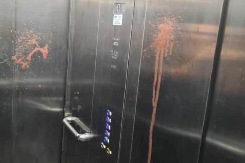 Blood spit over the lift in Triangle Housing Association's Patrick Street apartments.