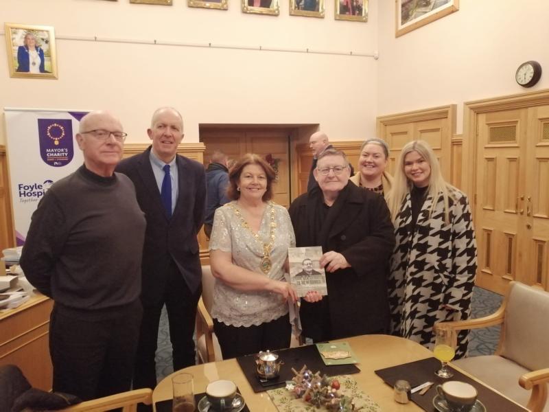 Mayor receives copy of Tony Hassan, Derry's longest serving Sinn Féin councillor's, Memoir