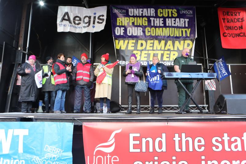 Platform speakers at Derry Fair Pay rally.