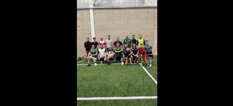 Ciarán McCarron centre with the social hurlers.