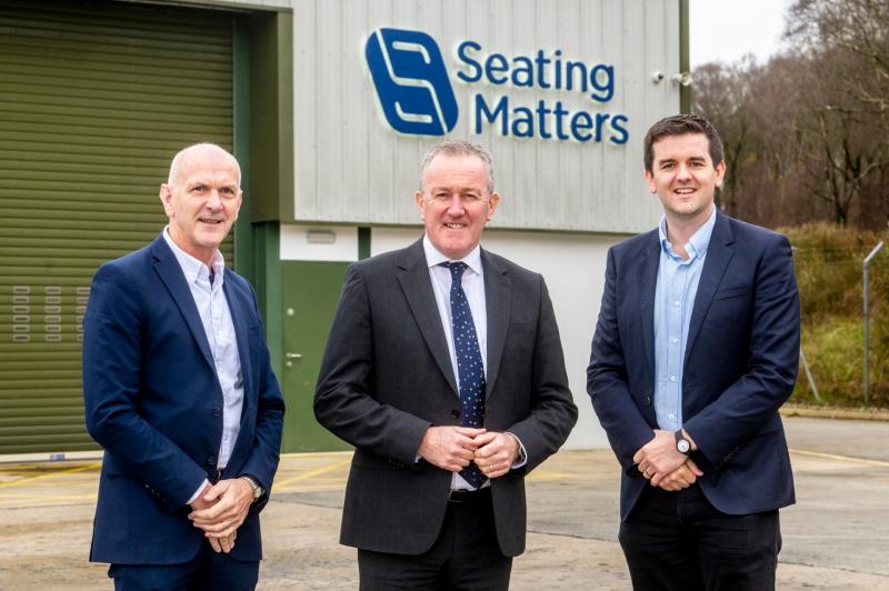 Pictured with Economy Minister Conor Murphy are George McKinney, Invest NI (left) and Martin Tierney, Seating Matters (right).