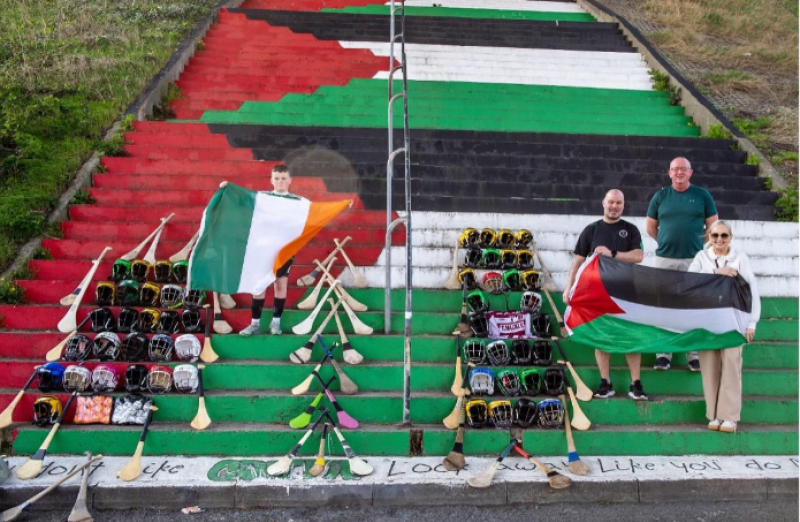 Damian McKane standing with the equipment in front of Palestine steps near Foyle Bridge 