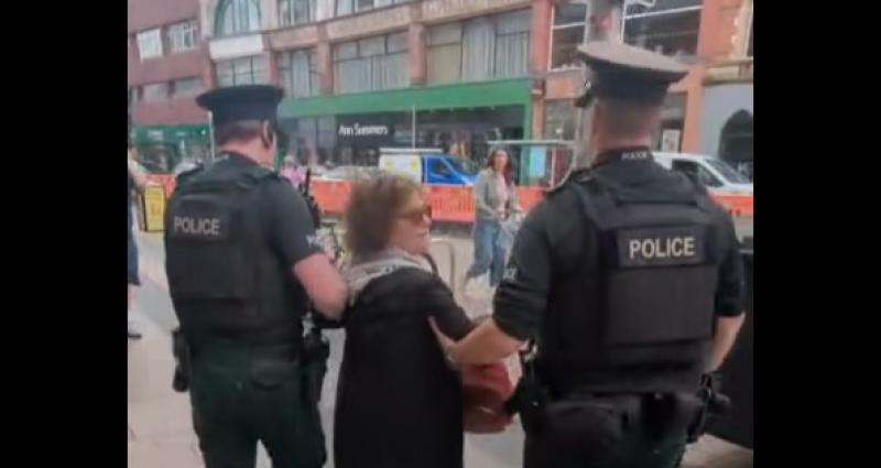PSNI arrest arrest  Sue Pentel, a 72-year-old grandmother at Palestine protest outside Barclays Bank.