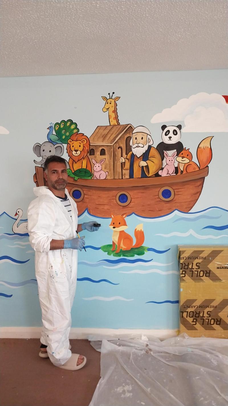 Portrush church thanks Iranian asylum seeker whose artistic talents have put smiles on little faces