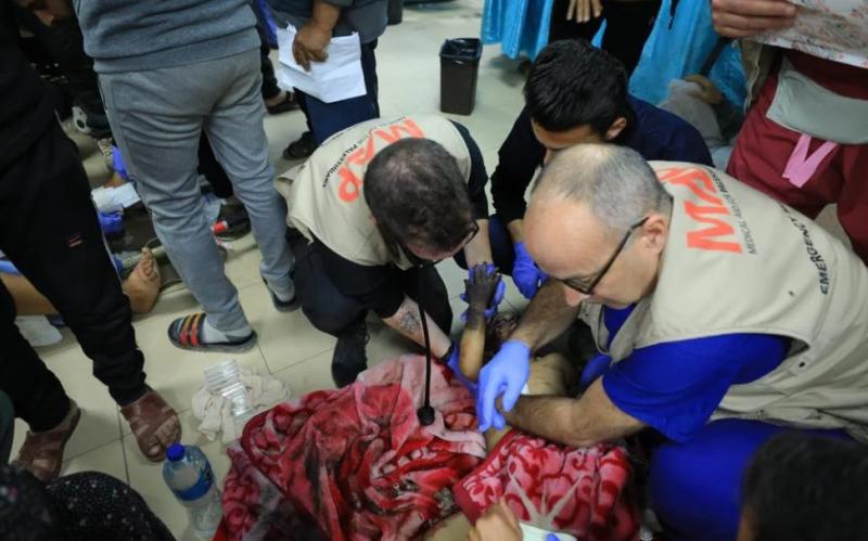 Professor Nick Maynard said the huge numbers of wounded children would 'never, ever leave [him]'. PHOTO CREDIT Prof Maynard - MAP.