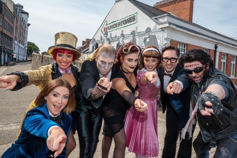The cast of The Rocky Horror Show enjoying a stroll on Derry's walls.