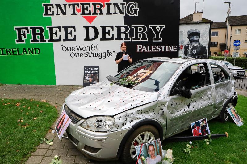 Emma-Jayne McGlinchey reading ‘Her Name Was Hind’ art installation & vigil at Free Derry Corner, Five years old Hind Rajab was murdered alongside her family by the IDF (Pic: T Heaney, nwpresspics)