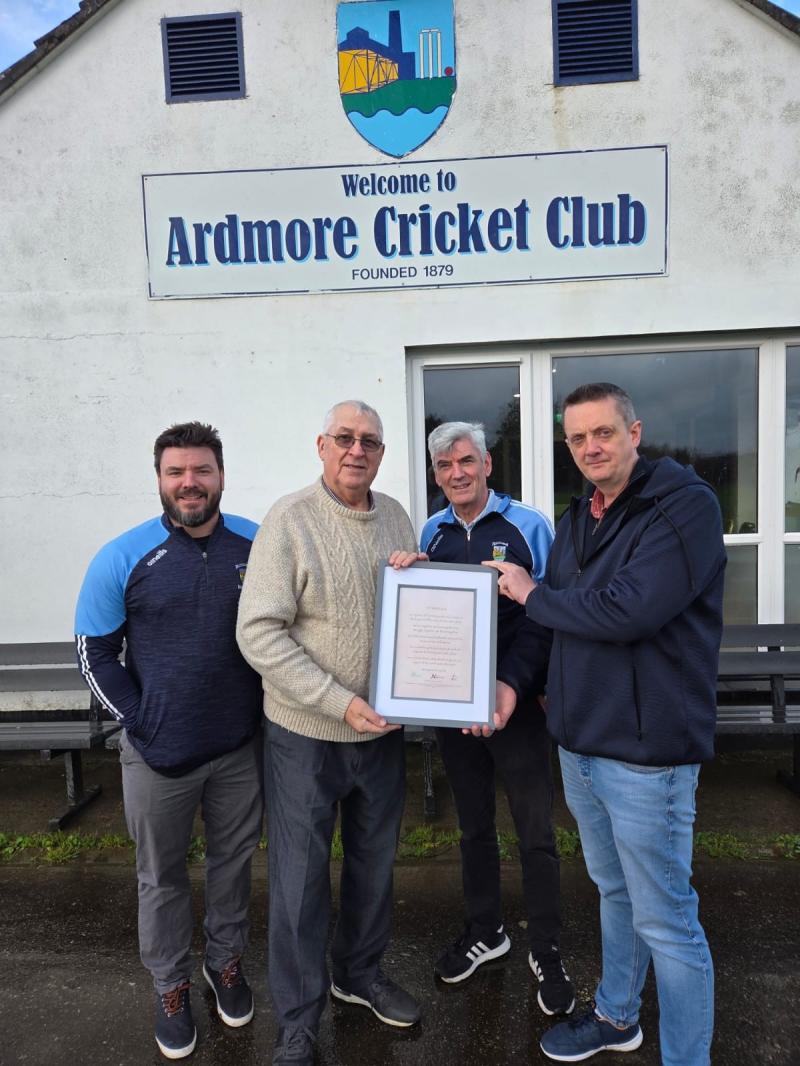 Ardmore Cricket Club President George Chambers, Chairman Dermot Ward and Incoming Captain Mark Chambers receiving a copy of the Charter from North West Migrants Forum Media Officer Conor Sharkey.
