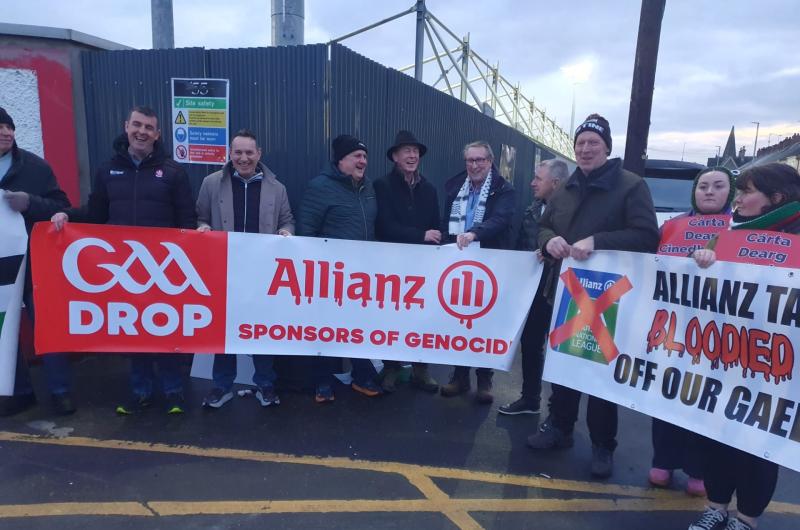 Derry and Tyrone greats at Saturday's Celtic Park 'Drop Allianz' protest.