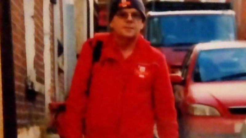 Popular postie Don Redden delivering letters on High Street in the city.