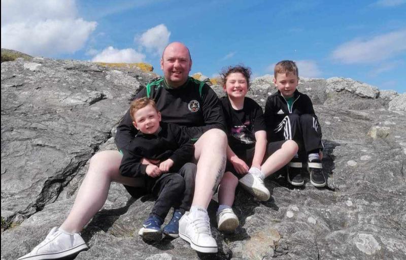 Joe Blee, co-chair of Glenowen Residents' Committee with his children, Ida, Donncha and Cathaoir.