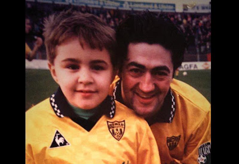 Dancing with the Stars finalist, Carl Mullan (7) as a young mascot for Derry City with legend Peter (Pizza) Hutton. The photo was taken in Dalymount Park in 1997. 