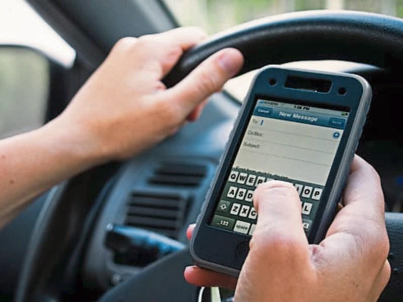 Mobile phone taken from car in Naas