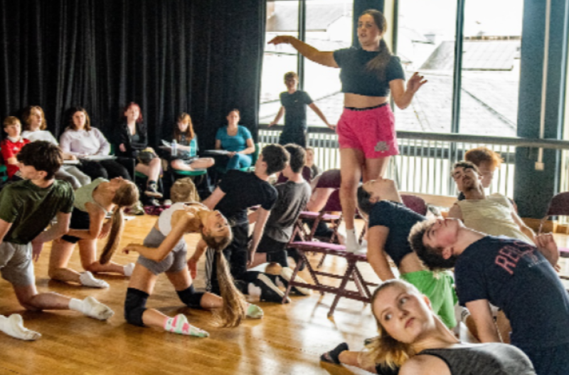 The cast for FAME rehearsing in the Millennium Forum Studio