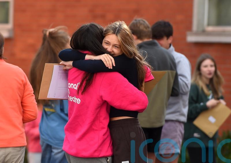 Smiles and hugs as pupils gather to receive GCSE results