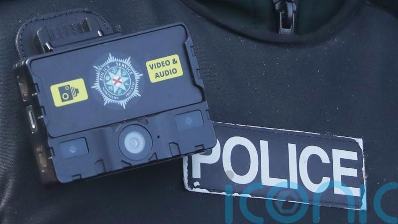 Man charged after police officer butted and kicked in the head