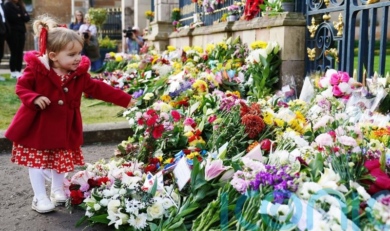 Sleepy village becomes centre for outpouring of grief in Northern Ireland