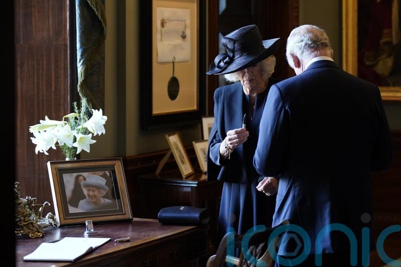 King Charles blasts pen after it appeared to leak while signing book