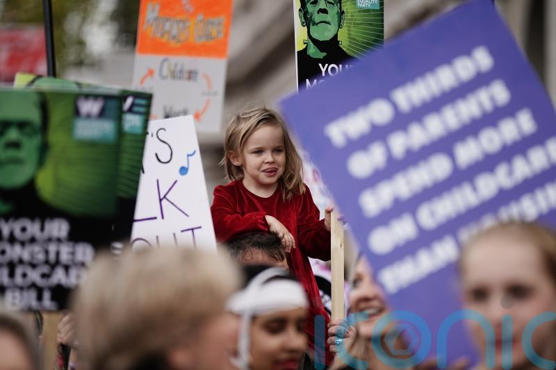 Thousands join March of the Mummies to demand childcare reforms