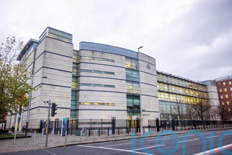 Man charged with causing bomb explosion in 1990