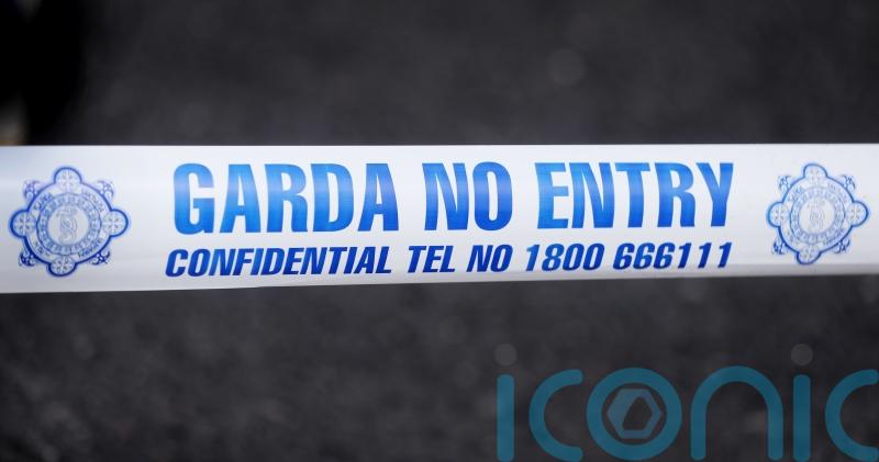 Man arrested on suspicion of murder after body found in burning house