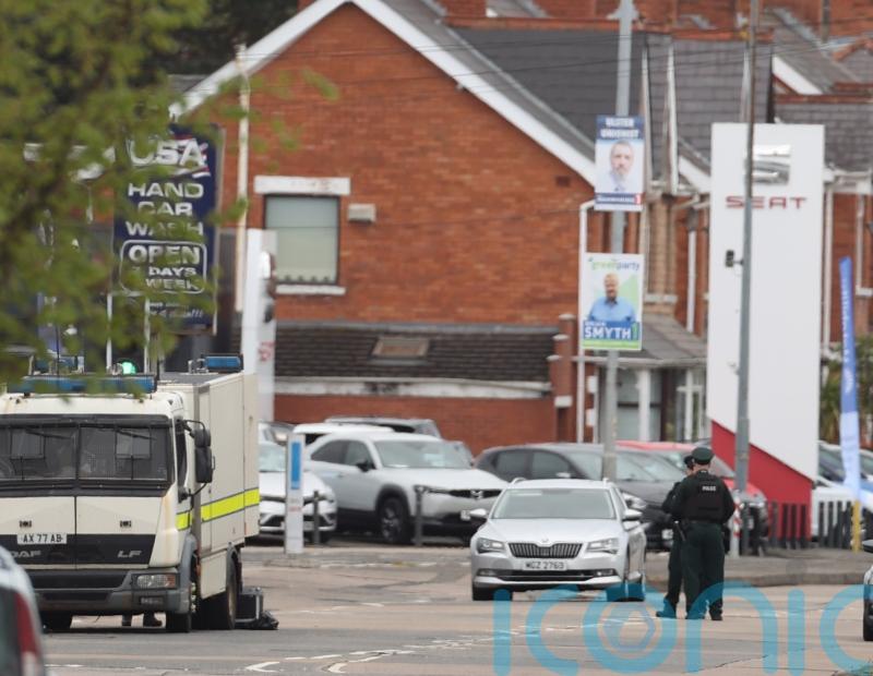 Man arrested after crash near Belfast police station