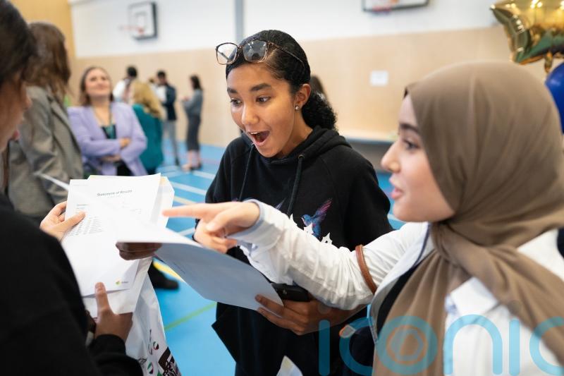 Top GCSE results fall in return to pre-Covid grading system