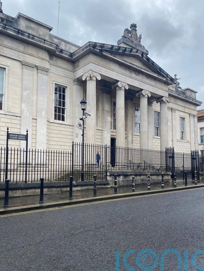 Father and daughter in court over Derry weapons find