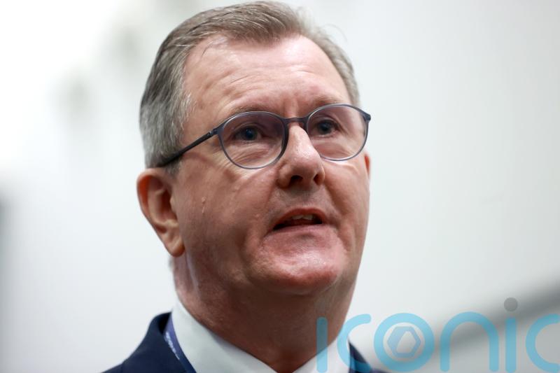 Donaldson says he will not ‘bow to threats’ amid warning of loyalist protests