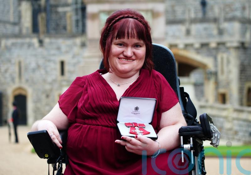 Disability rights activist becomes MBE in Windsor Castle ceremony