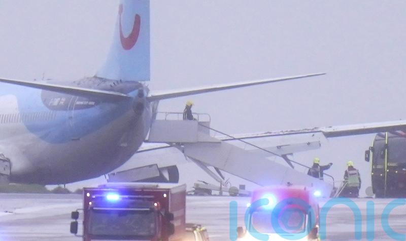 Third person dies and plane skids off runway as Storm Babet batters UK