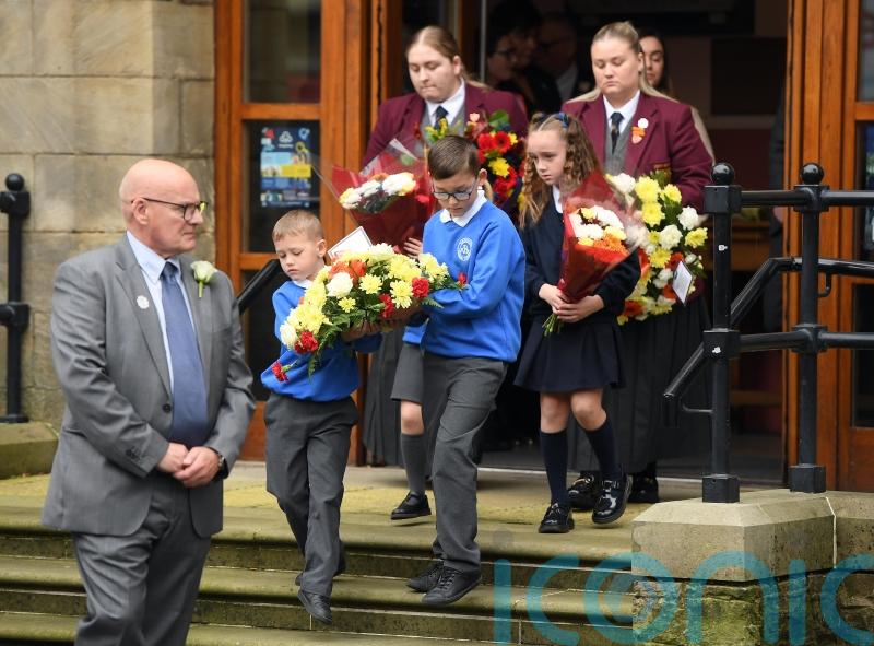 Shankill Road falls silent to remember one of the darkest days of the Troubles