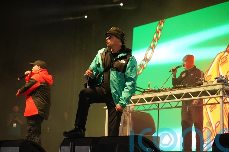 Belfast rappers Kneecap threaten legal action over UK government ‘funding block’