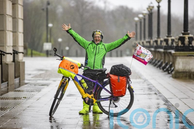 Timmy Mallett visits Stormont during Northern Ireland cycle trip